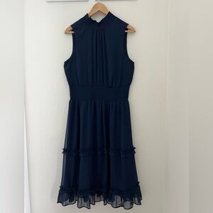 Sleeveless, high neck dress
